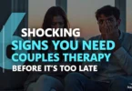 Couple sitting apart looking stressed during an argument, symbolizing relationship problems and the need for couples therapy.
